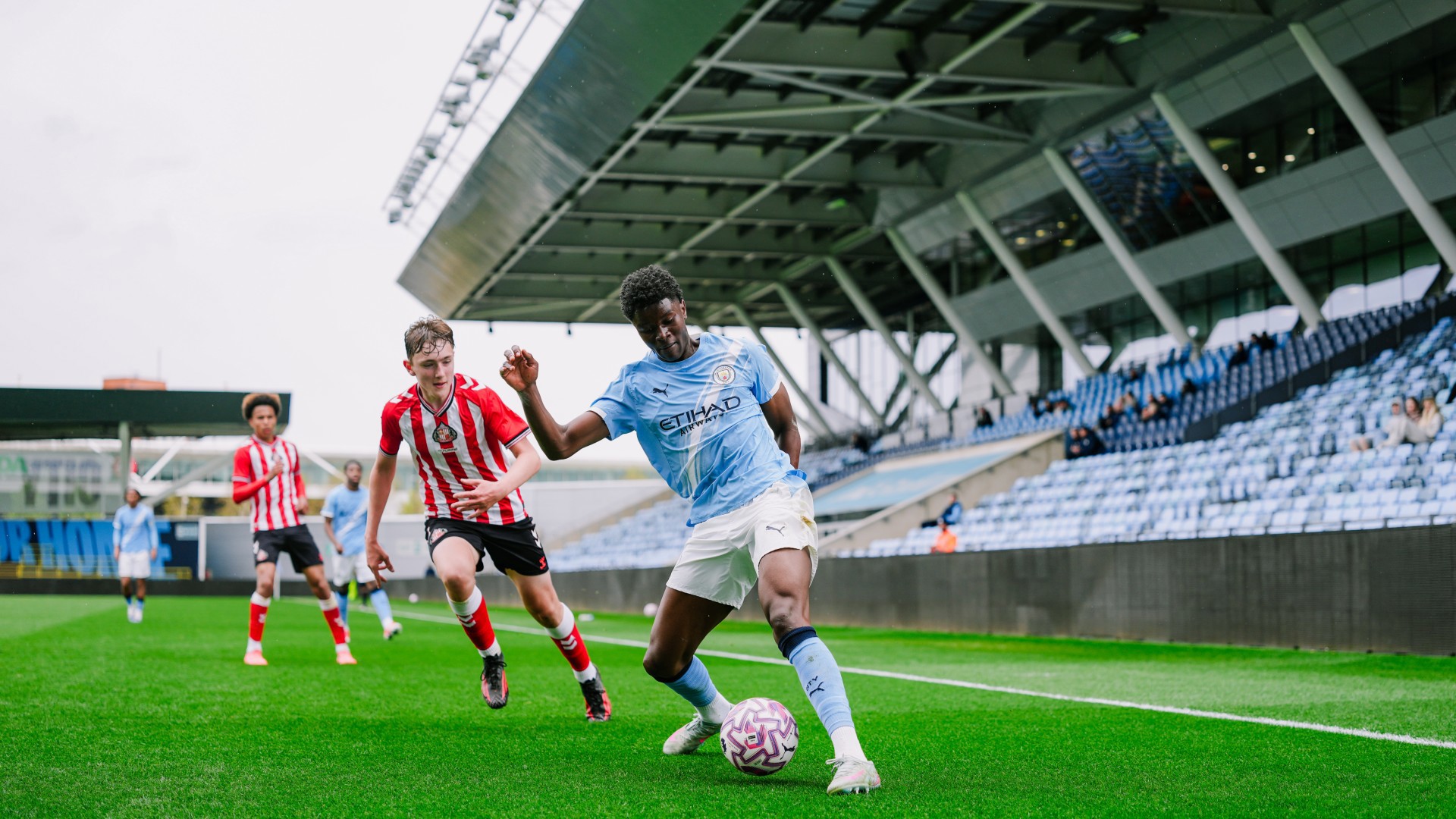 COMPOSED CASSIM : Karim on the ball.