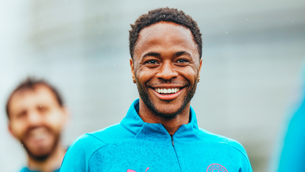 CHEESY GRIN : Raheem Sterling is all smiles after his two goals against Newcastle on Sunday