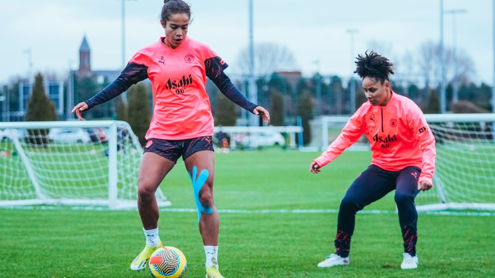 CLOSE CONTROL : Mary Fowler in possession under pressure from Demi Stokes.