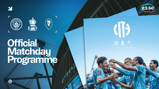 Manchester City Official Matchday Programme featuring the Etihad Stadium and players celebrating. Includes club logos and the FA Cup icon.