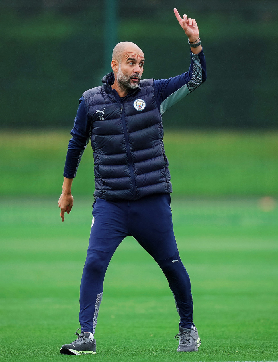 PEP TALK : Pep Guardiola dishes out some instructions