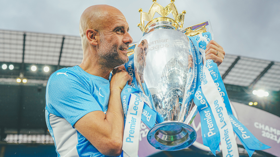 HANDS ON : Pep gets hold of the Premier League trophy