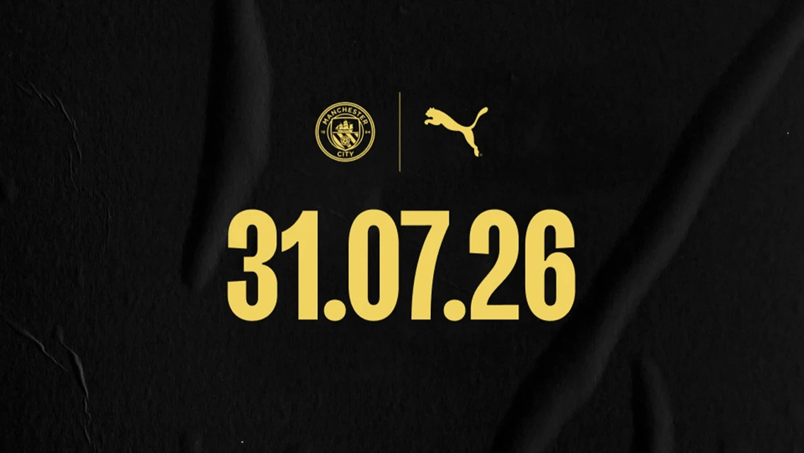 Image featuring Manchester City and Puma logos with the date 31.07.26 prominently displayed in yellow on a black background.