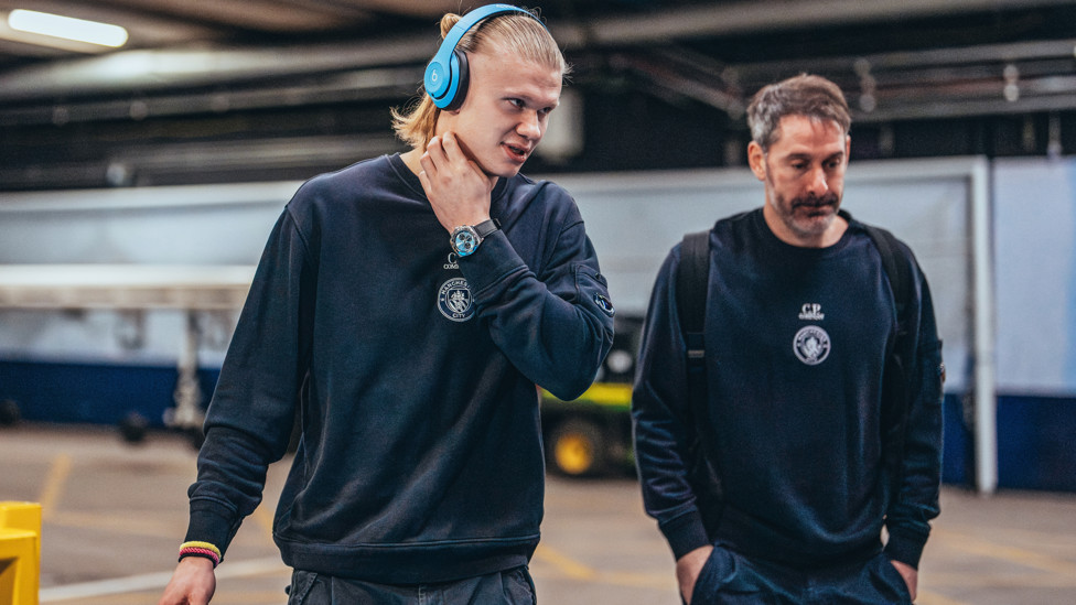 ARRIVAL : Haaland and Carson arrive into the stadium via the service tunnel due to an unfortunate fire outside the stadium.