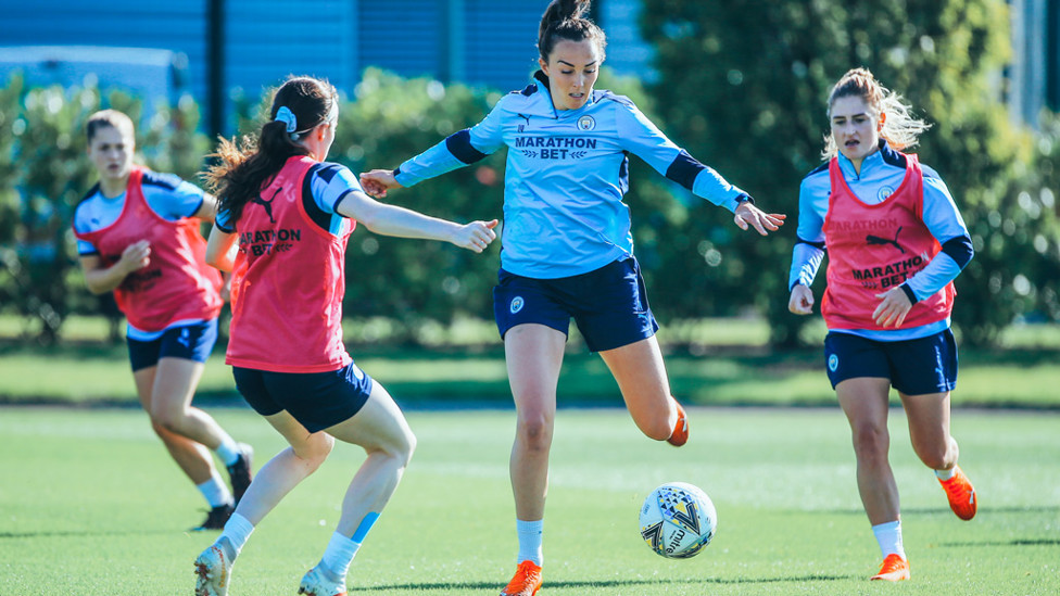 ACTION STATIONS: Caroline Weir vies for the ball with Rose Lavelle