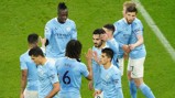 SHARE THE LOVE: The players gather to congratulate Gudogan after this opener.