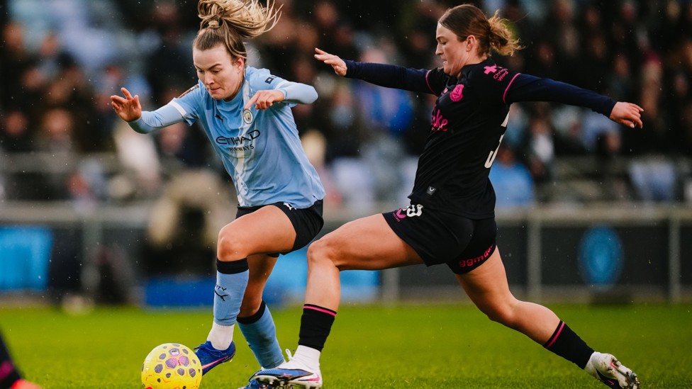 WING COMMAND : Lauren Hemp jinks away from Ruby Mace