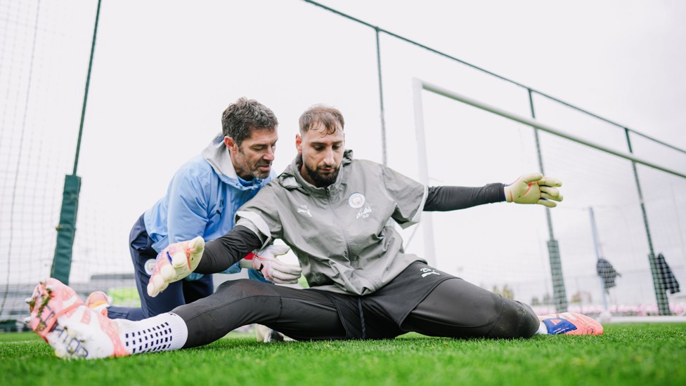 Long stretch : One of our talented goalkeeper coaches helps Donnarumma make himself (even) bigger!