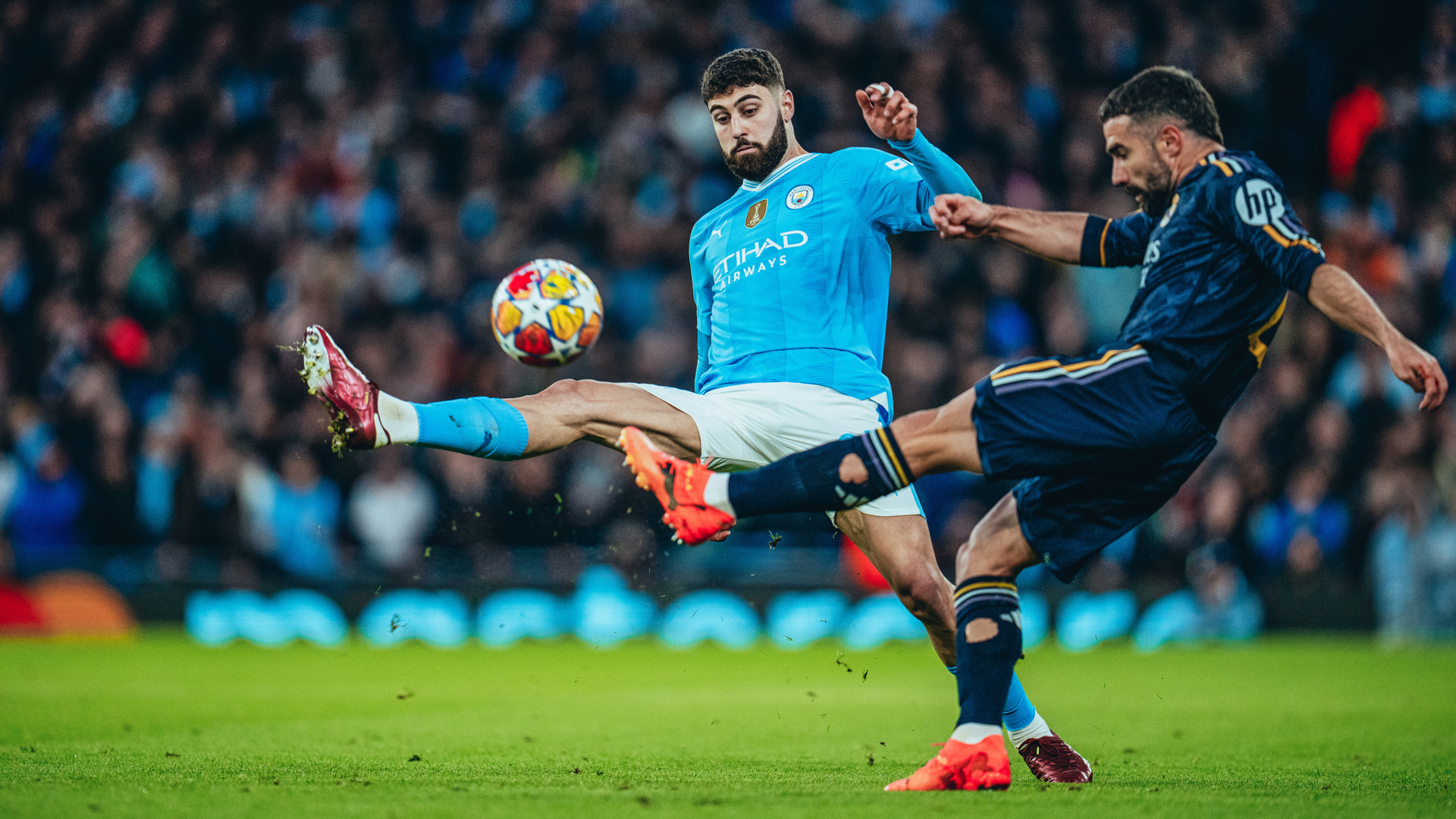 AT FULL STRETCH: Josko Gvardiol seeks to block a Dani Carvajal cross.