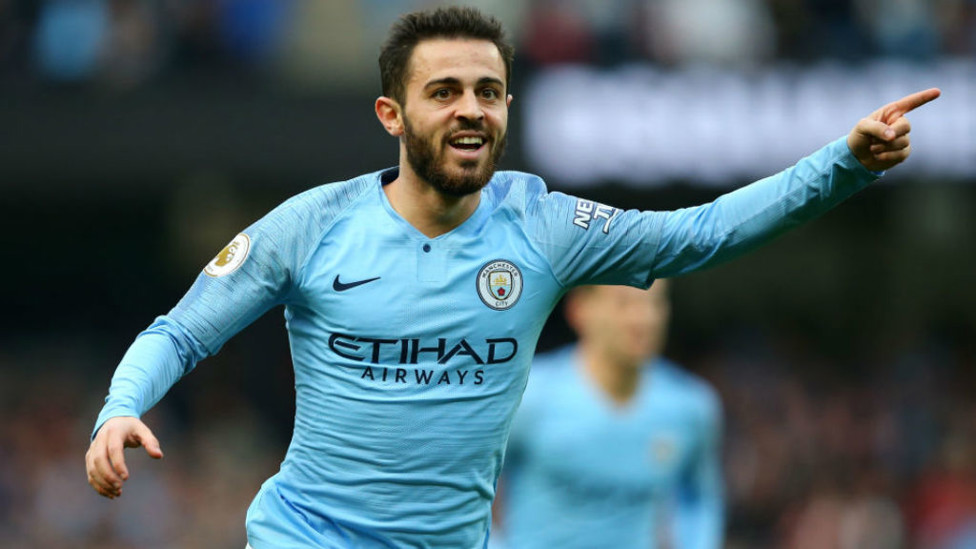 SOLID SILVA : Bernardo celebrates after firing home City's second goal