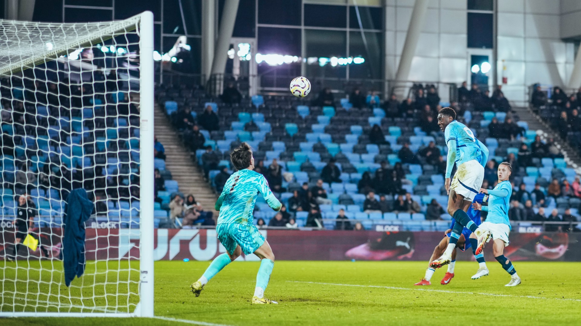 TREBLE HIT: Divin Mubama heads home to seal his hat-trick.