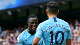 MERCI, MENDY!: Sergio Aguero thanks Benjamin Mendy for his assist, having completed his hat-trick with a glorious flick