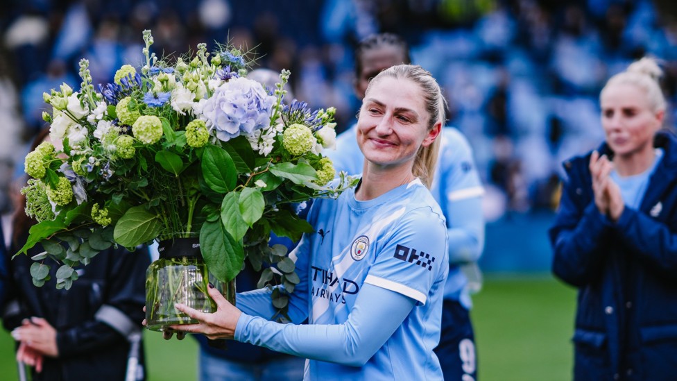 FITTING TRIBUTE : Laura's more than earned her flowers!