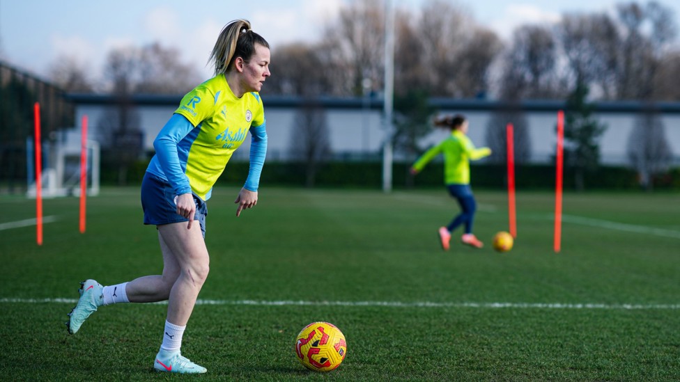 WING WIZARD  : Lauren Hemp drives with the ball.