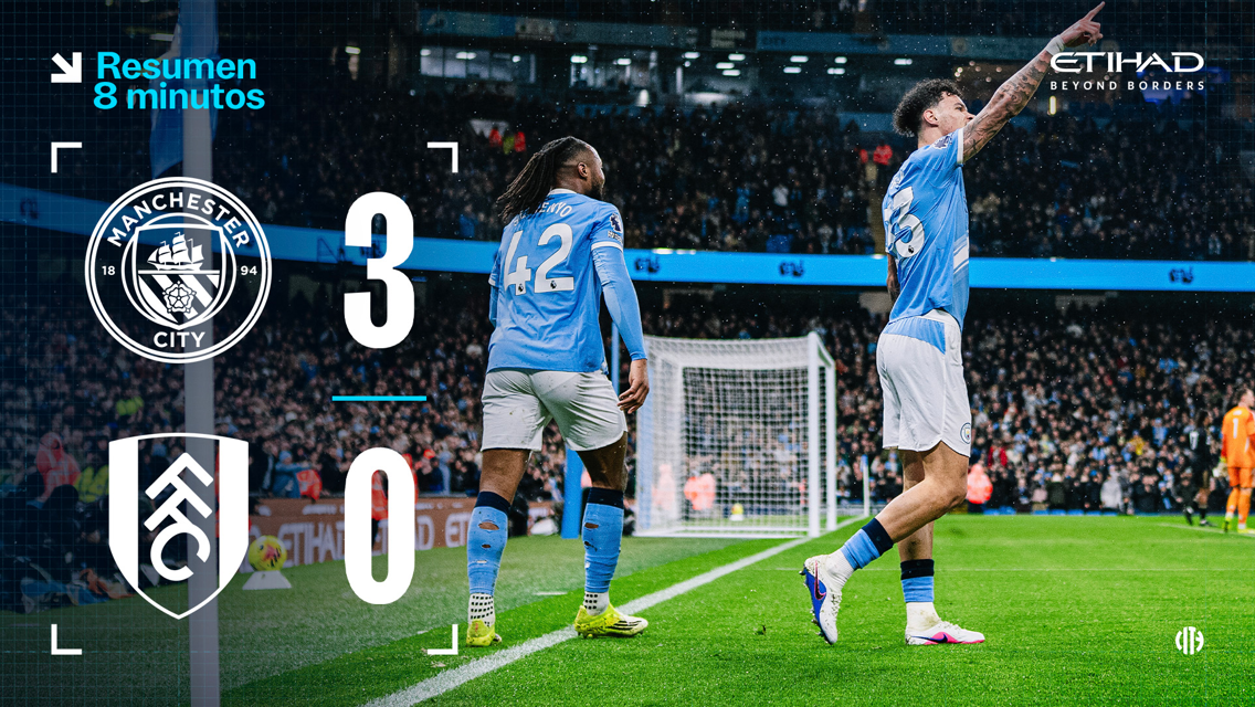 Manchester City defeated Fulham 3-0. The image shows two Manchester City players celebrating a goal at Etihad Stadium.