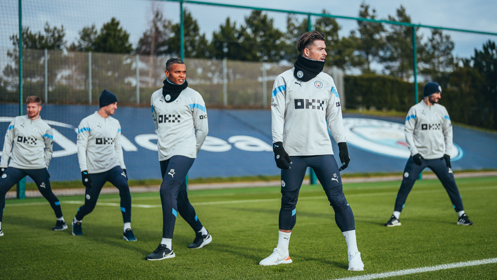 STRIKE A POSE : The lads limber up before training