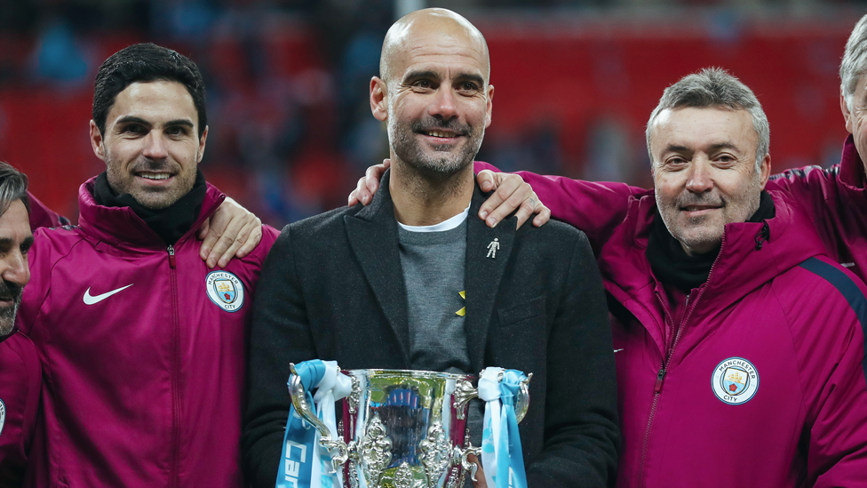 TEAM GAME : Guardiola enjoys one of four League Cup triumphs alongside then assistants Mikel Arteta and Dominec Torrent