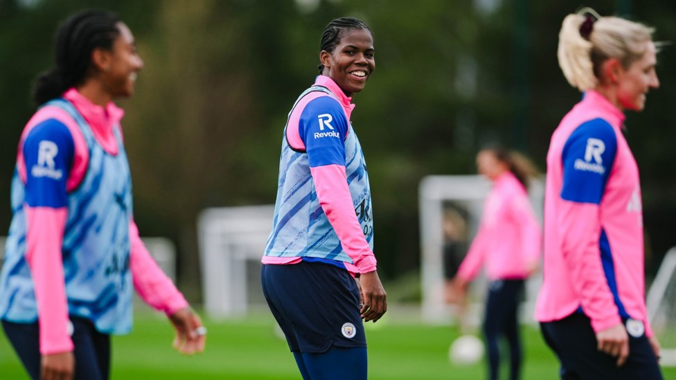 ALL SMILES: Bunny Shaw shares a grin during training