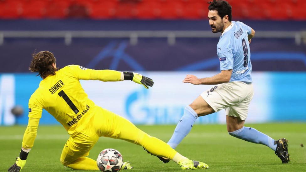  DOUBLE TROUBLE: Ilkay Gundogan makes it two with a clinical finish under Yann Sommer