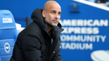 THE BOSS: Guardiola looks on from the dugout.