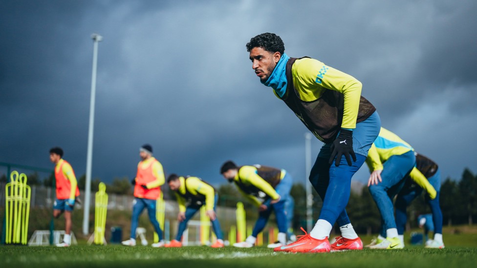 PREPARING TO TRAIN : Omar Marmoush stretches at the start of training.