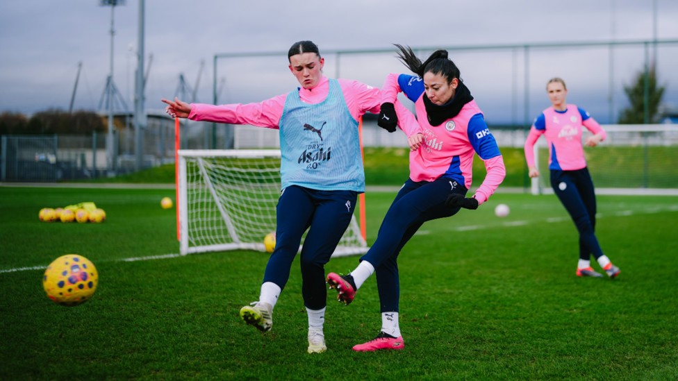 ACTION STATIONS: Lily Murphy and Leila Ouahabi vie for possession.