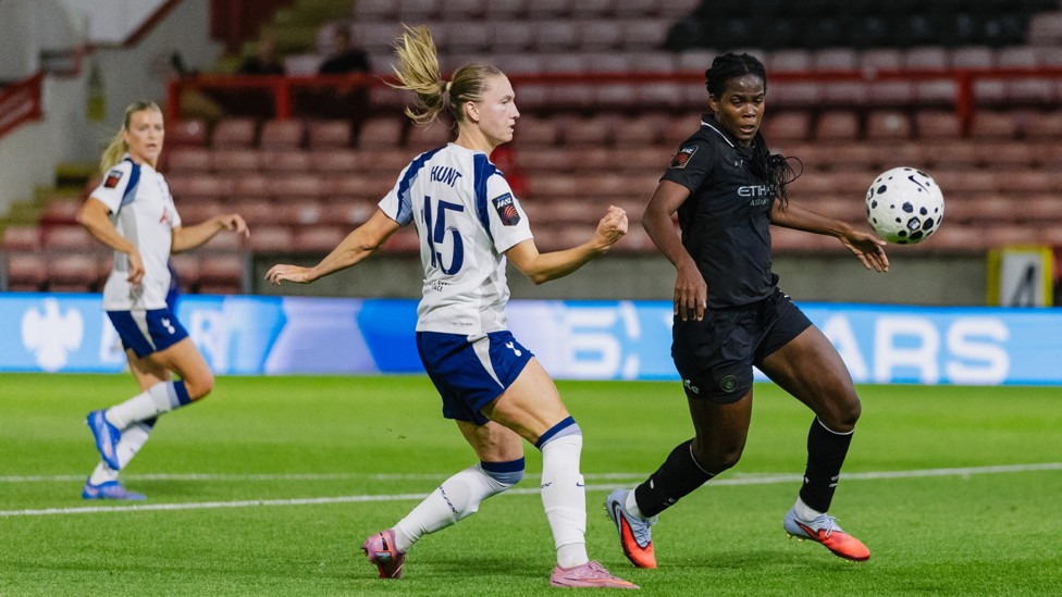 BATTLING BUNNY : Bunny Shaw competes for the ball with Clare Hunt