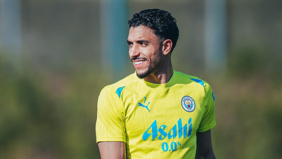 NEED SOME TIME IN THE SUNSHINE  : Omar Marmoush enjoys the Manchester weather.