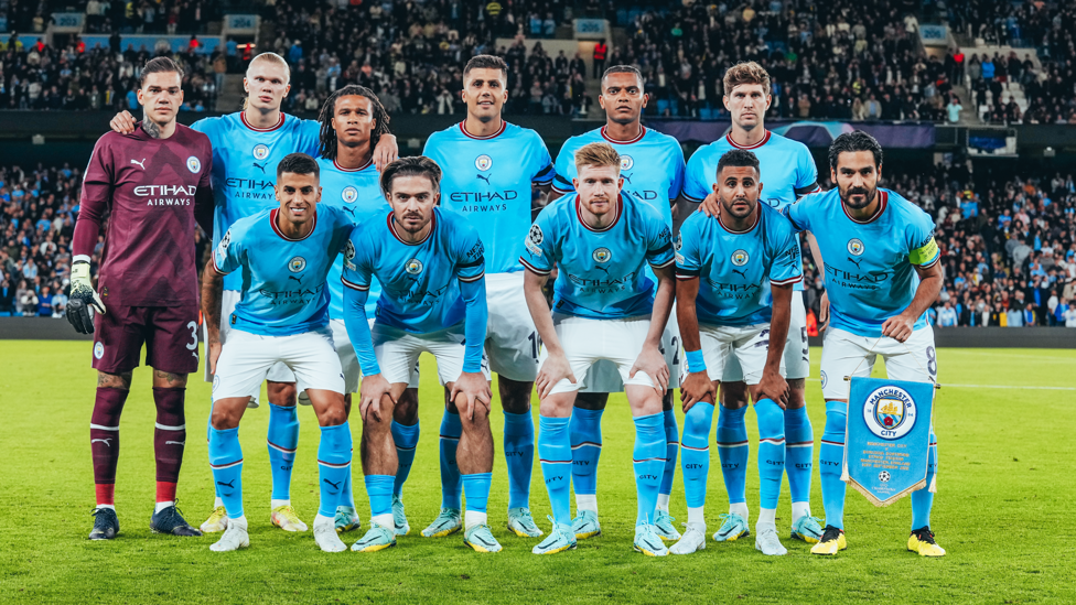 SQUAD GOALS : The starters strike a pose ahead of kick off.