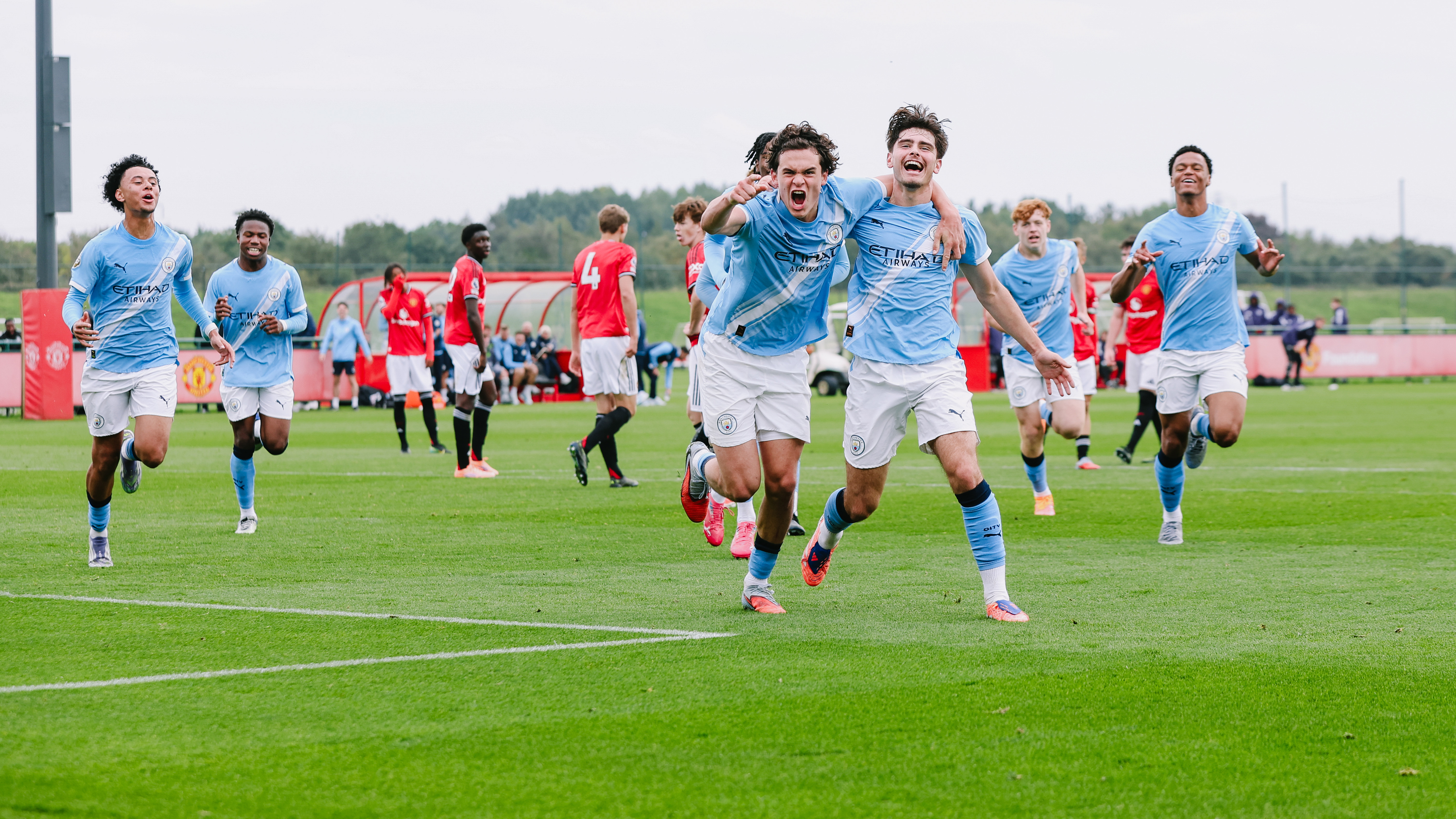 TAKING THE LEAD : Harrison Miles, Teddie Lamb and the team celebrate going ahead. 
