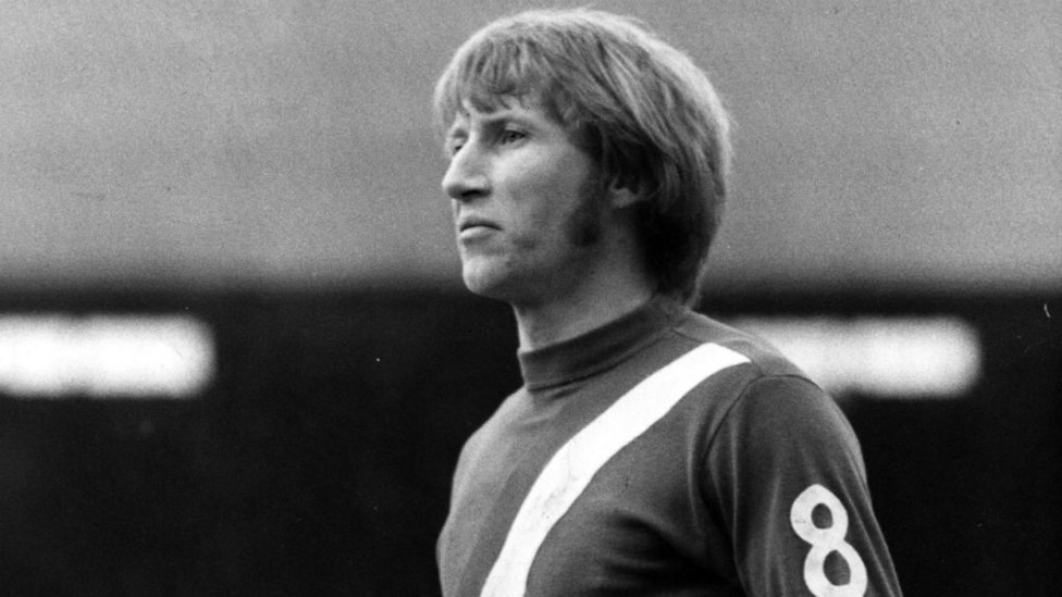 BLUE BELL : Colin in a famous dark blue number from the 70s