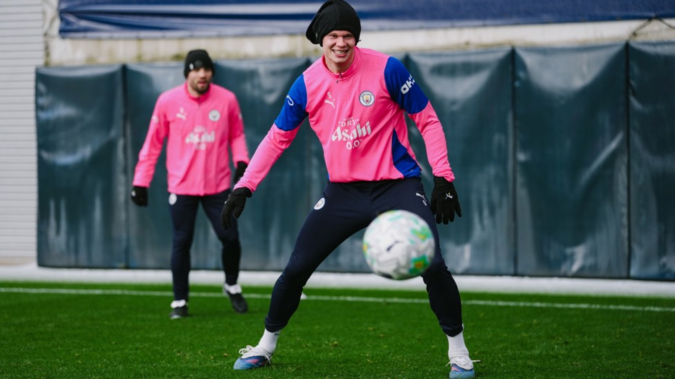 HAT TRICK: Erling Haaland and Mateo Kovacic sported some nifty headwear to keep out the March chill.