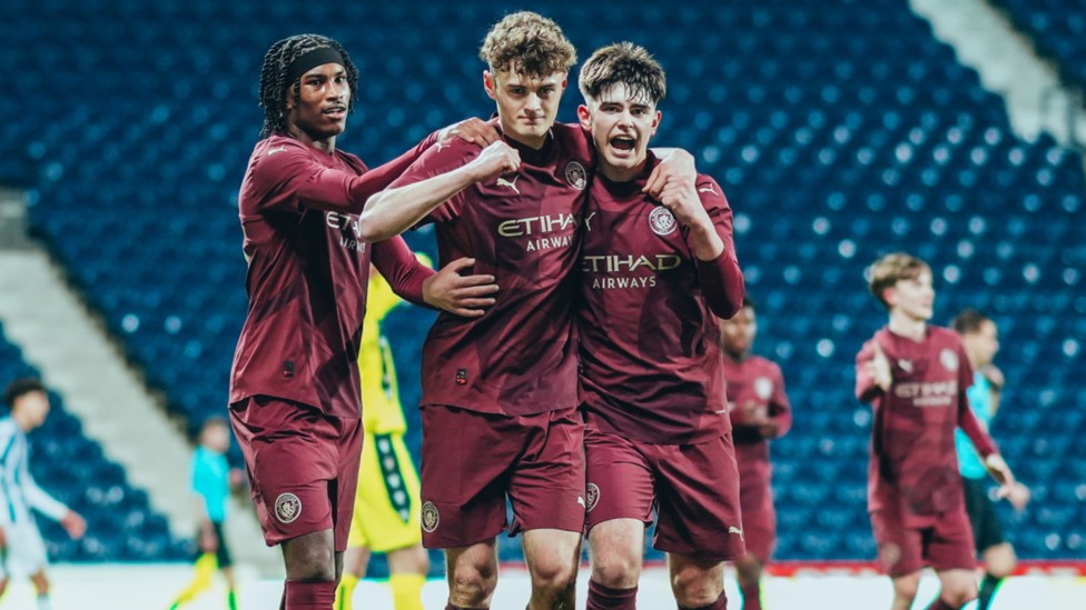 STRIKE ONE: Matty Warhurst celebrates after firing City ahead.