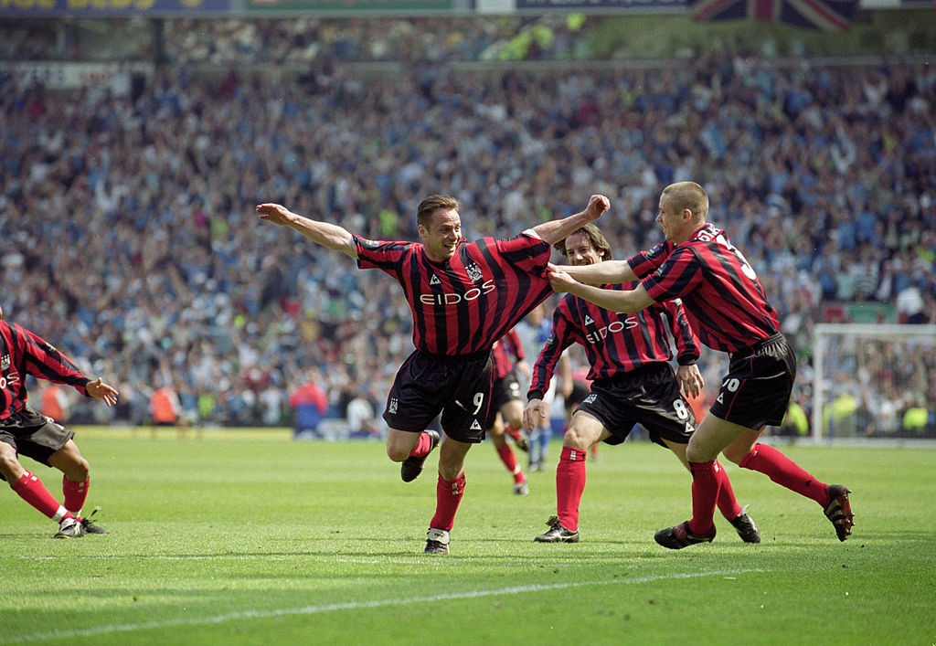 ROVERJOYED: City on the way to promotion - in red and black - at Blackburn in 2000