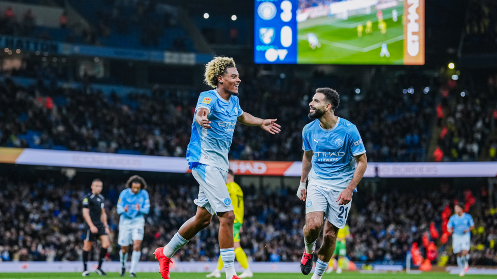 AWESOME FOURSOME: Floyd Samba celebrates after his second and City's fourth.