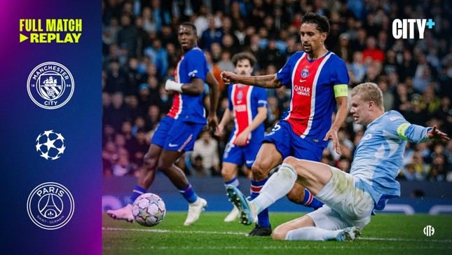 A soccer match between Manchester City and Paris Saint-Germain, featuring a slide tackle. Logos for both teams and the UEFA Champions League are visible. It mentions 'Full Match Replay' and 'City+' on the left side.