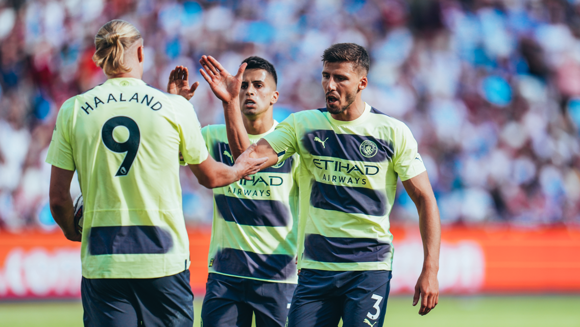 HIGH FIVE: Dias congratulates Haaland after his first City goal.