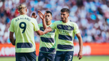 HIGH FIVE: Dias congratulates Haaland after his first City goal.