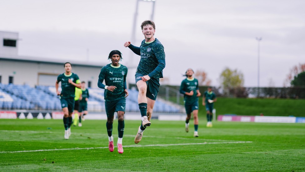 WHAT IT MEANS : Charlie Gray jumps for joy. 
