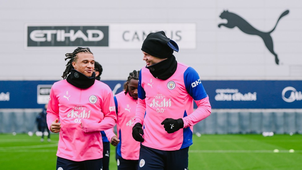 WARMING UP : Nathan Ake and Erling Haaland get moving