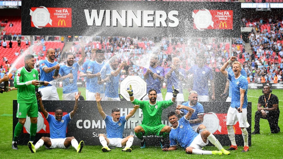 CHAMPAGNE SUPERNOVA : Claudio Bravo leads the celebrations after making a key save in the penalty shoot-out.