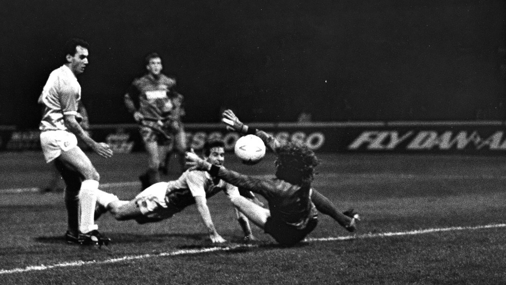 Moulden was a predator in the box - here, he dives to head home while Imre Varadi watches on