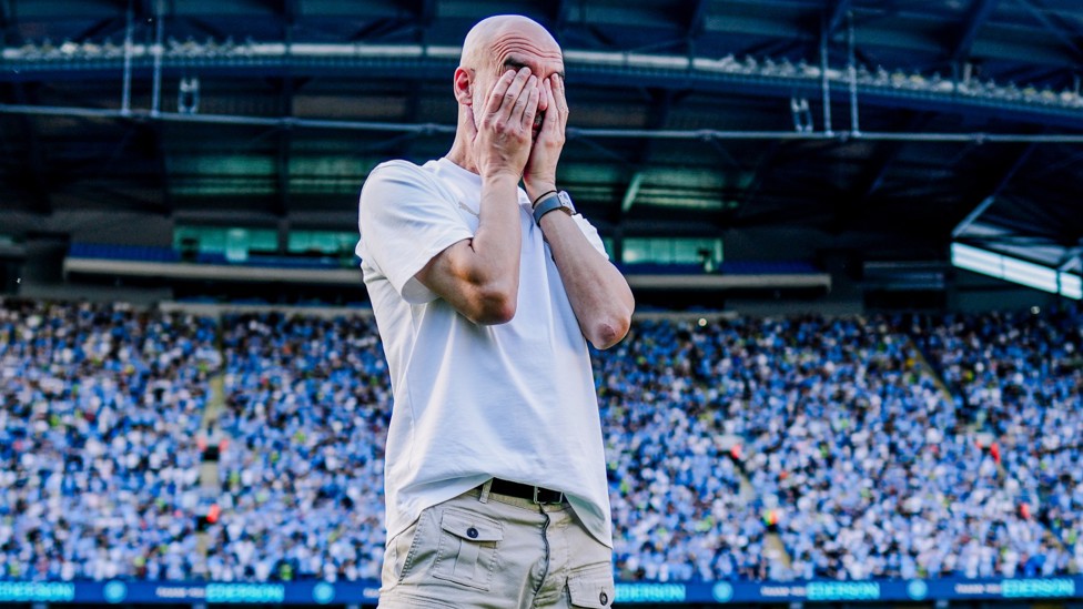 EMOTIONAL MOMENTS : Pep Guardiola composes himself before addressing his adoring public.