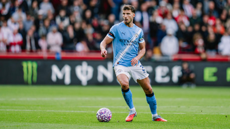 DOMINANT DIAS: Playing out from the back.