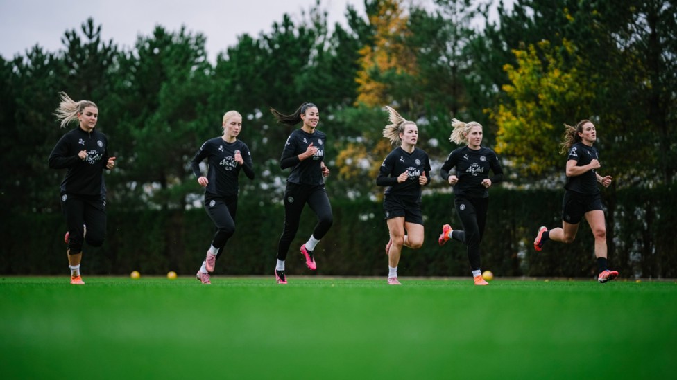 ALL TOGETHER NOW: The City squad go through a Tuesday training drill.