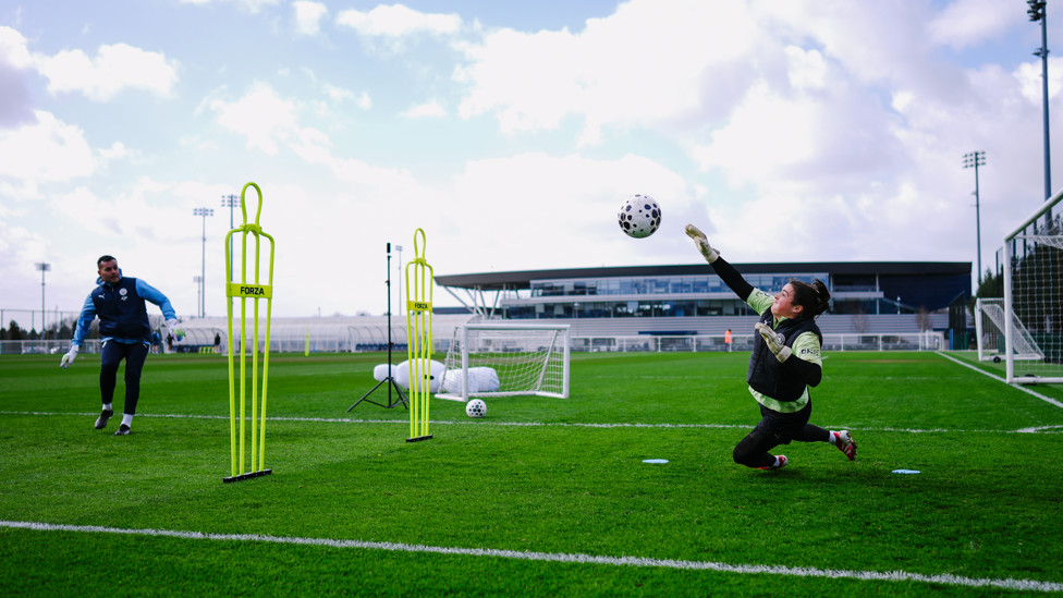 UP IN THE SKY  : Eartha Cumings makes a top save. 