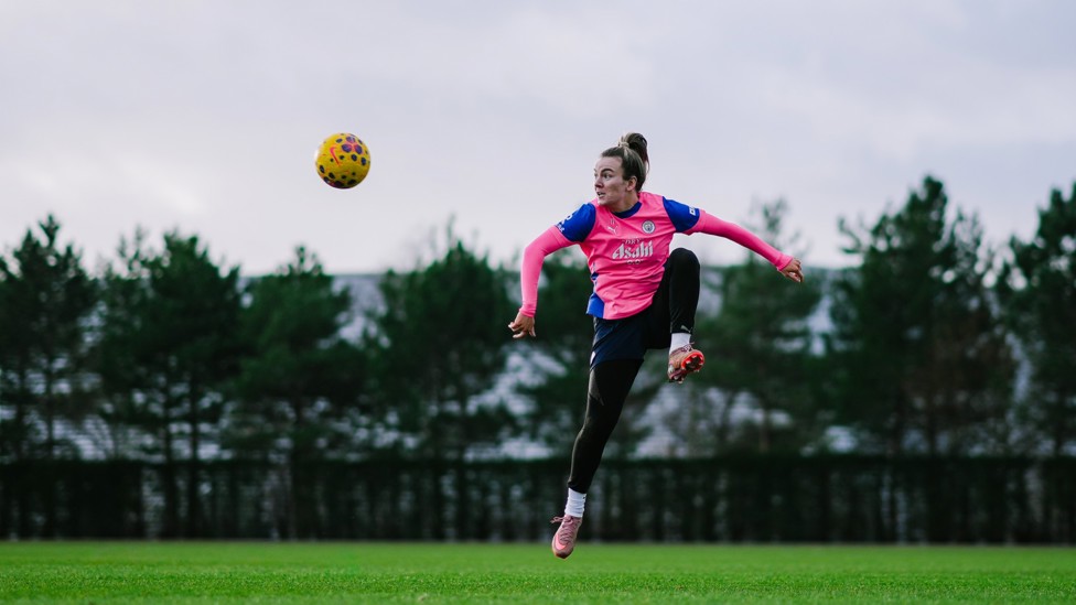 BRING IT DOWN : Lauren Hemp readies herself for a touch