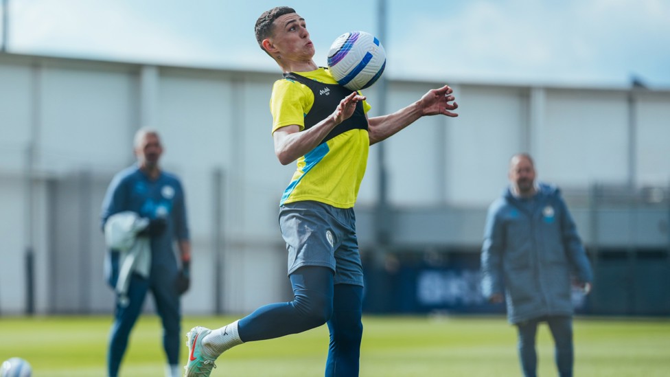 UNDER HIS SPELL : Phil Foden gets the ball under control. 
