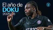Promotional image featuring a football player in a Manchester City jersey, with text 'El año de DOKU 2025/26.'