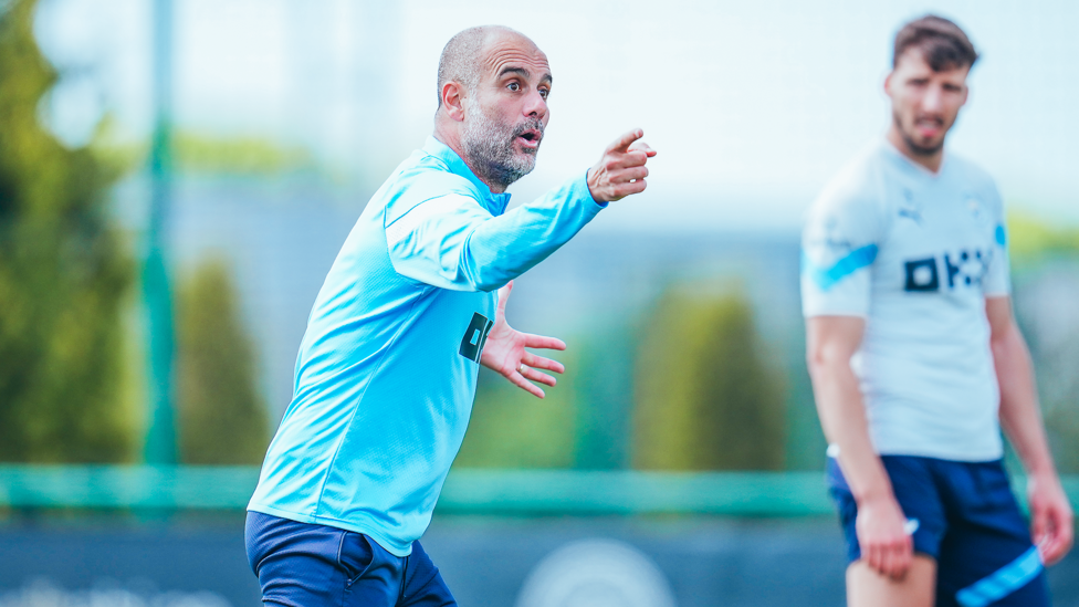 THE BOSS : Pep Guardiola offers instructions during training.